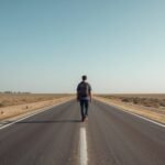 Lucid_Origin_professional_photo_of_A_person_walking_alone_on_a_2-1024x573